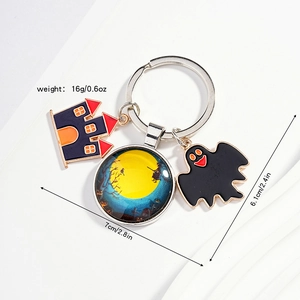 Detailed Halloween keychain with enamel castle, ghost and full moon witch pendants