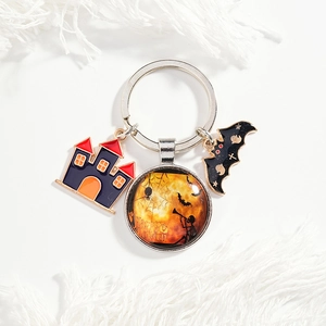 Halloween keychain with enamel castle, bat pendant and Happy Halloween glass dome charm