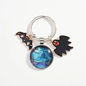 Halloween keychain with bat, ghost, and night moon glass pendant on silver ring