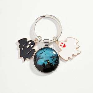 Halloween keychain featuring blue night castle glass dome and cute ghost charms