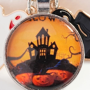 Portachiavi Halloween con ciondolo castello di zucca in vetro e ciondoli fantasma e pipistrello