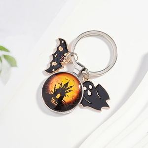 Creative Halloween keychain with spooky castle charm, cartoon bat and ghost pendants