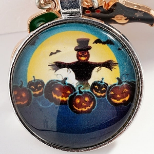 Halloween pumpkin scarecrow glass keychain with bat and moon in metallic setting