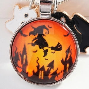 Halloween keychain with witch glass ball, white ghost and black owl charms