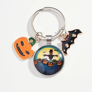 Halloween keychain with orange pumpkin, black bat, and scarecrow glass pendant on white background