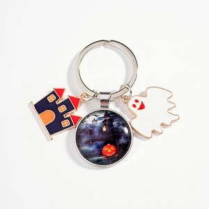 Halloween keychain with ghost, haunted house pendants and spooky castle glass charm