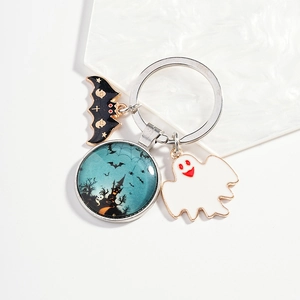 DIY Halloween keychain with black bat, playful ghost and gothic castle glass pendant