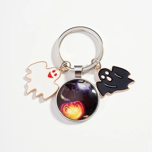 Halloween keychain with white ghost, black ghost, and pumpkin glass pendant charms