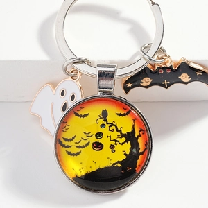 Halloween keychain with 3D ghost, bat pendant and pumpkin illustration on metal ring