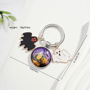 Halloween keychain featuring ghost charms and purple castle glass pendant, 7cm size