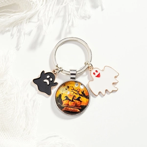 Halloween keychain with pumpkin glass pendant, black and white ghost alloy charms