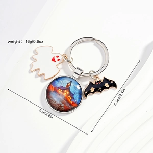 Detailed Halloween keychain size guide with blue castle glass dome, ghost and bat charms