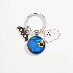 Halloween keychain with witch glass pendant, bat and ghost charms on silver metal ring