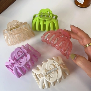 Large minimalist hair claw clips set in matte and translucent pastel colors for thick hair