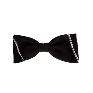 Elegant black bow hair clip with faux pearl trim and minimalist French vintage style