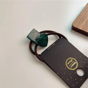 Elastic coffee hair tie with dark green geometric heart and square acrylic charms