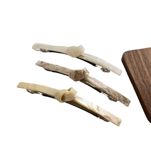 Three-piece minimalist twisted spring hair clips with marble texture for women