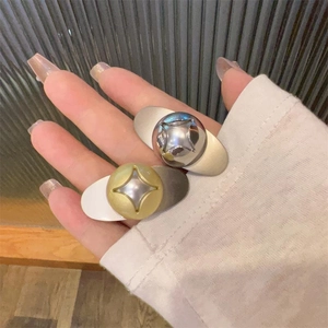 Minimalist gold and silver metallic teardrop hair clips with star embossed center beads