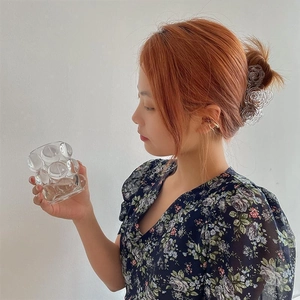 Elegant rose floral hollow hair claw clip in clear resin finish for thick hair styling