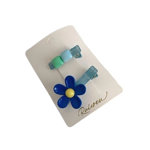Set of two colorful floral and beaded hair clips in cute Korean candy style for girls