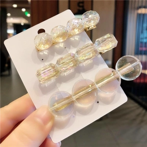 Set di tre fermagli per capelli a cubetto di ghiaccio con foglia d'oro su carta