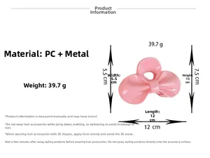 Pince à cheveux rose en forme de nœud dimensions 12cm et détails du matériau PC