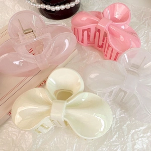 Pinces à cheveux nœud élégantes en crème et rose pour des coiffures féminines stylées