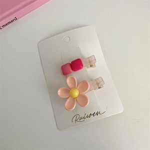 Cute Korean style pink floral and beaded hair clip set on a white display card