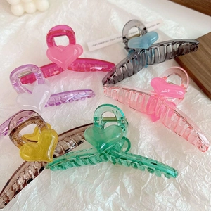 Elegant large heart hair claw clips in assorted pastel colors for thick hair