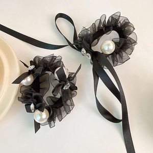 Elegant black mesh scrunchie with faux pearls, rhinestone bow, and long silk ribbons