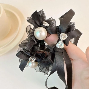 Elegant black ribbon mesh scrunchie with pearls and heart crystal accessory