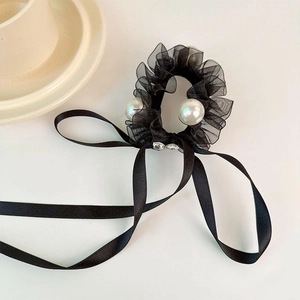 Elegant black lace bow scrunchie with large pearls and long ribbon streamers for hair