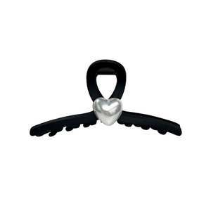 Elegant large matte black hair claw clip featuring a silver metallic heart accent piece