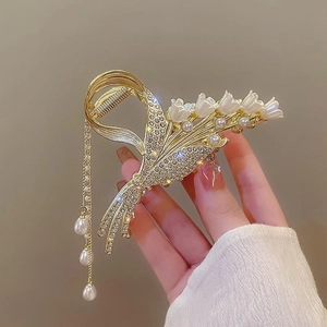 Elegant lily of the valley metal hair claw with white resin flowers and pearl tassels