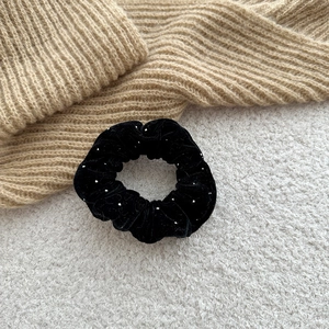 Elegant black velvet hair scrunchie with white crystal beads for high-end ponytail styling