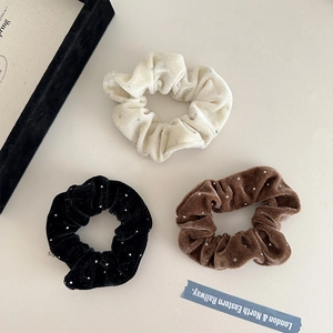 Three-piece velvet scrunchie set with sparkling rhinestones in cream, brown, and black