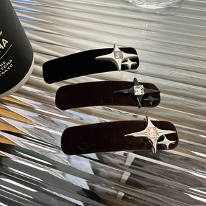 Three velvet hair clips with rhinestone star charms in black, brown, and dark coffee colors