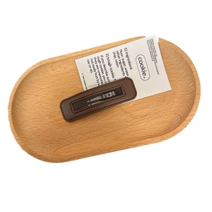 Brown leather square hair clip with stitching on creative cookie theme card packaging