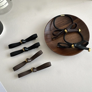 Elegant leather bow hair clips and scrunchies set in black and brown colors