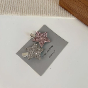 Lot de pinces à cheveux étoiles Y2K strass rose et argent sur carte de présentation