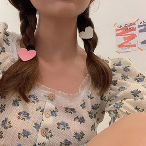 Cute candy-colored heart hair ties set in pink and white for sweet girls' styling