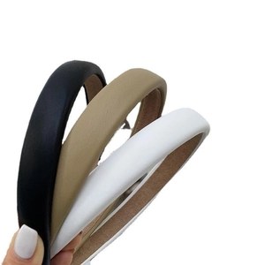 Vintage wide PU leather headband set in black, khaki, and white for a stylish hair look