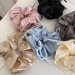 Set of 6 satin silk scrunchies with delicate ribbon bows in assorted pastel colors