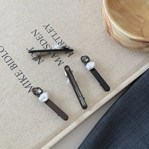 Set di 4 eleganti fermagli per capelli con cristalli grigi e perle su tela
