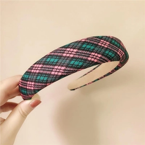 Checkered wide sponge headband in pink and green plaid fabric for a stylish hair look