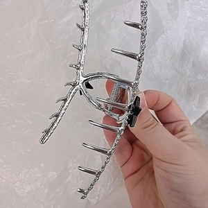 Grande pince à cheveux élégante en métal argenté avec étoiles strass et design de ramure