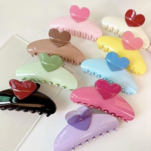 Large colorful heart hair claws in various vibrant candy colors for thick hair