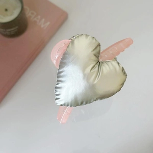 Oversized silver heart claw clip with pink base for women's elegant hair styling