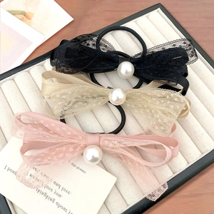 Set elastici per capelli con fiocco in pizzo e perla grande in tre colori eleganti