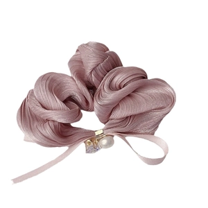 Elegant dusty pink bow scrunchie with a white faux pearl and heart-shaped crystal